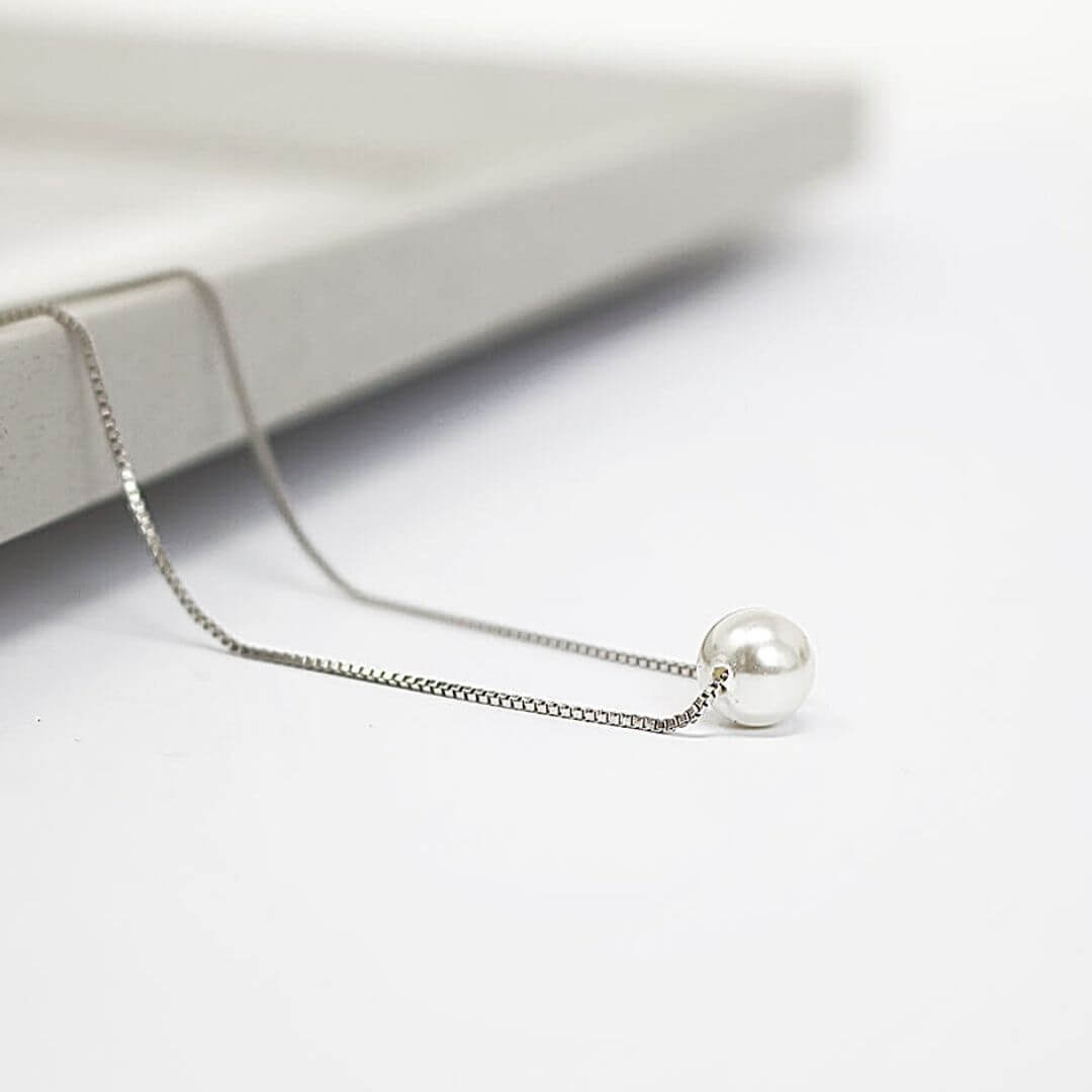 Freshwater Pearl Pendant Necklace shown on a grey display- BELLE DE SOIREE PEARL PENDANT NECKLACE