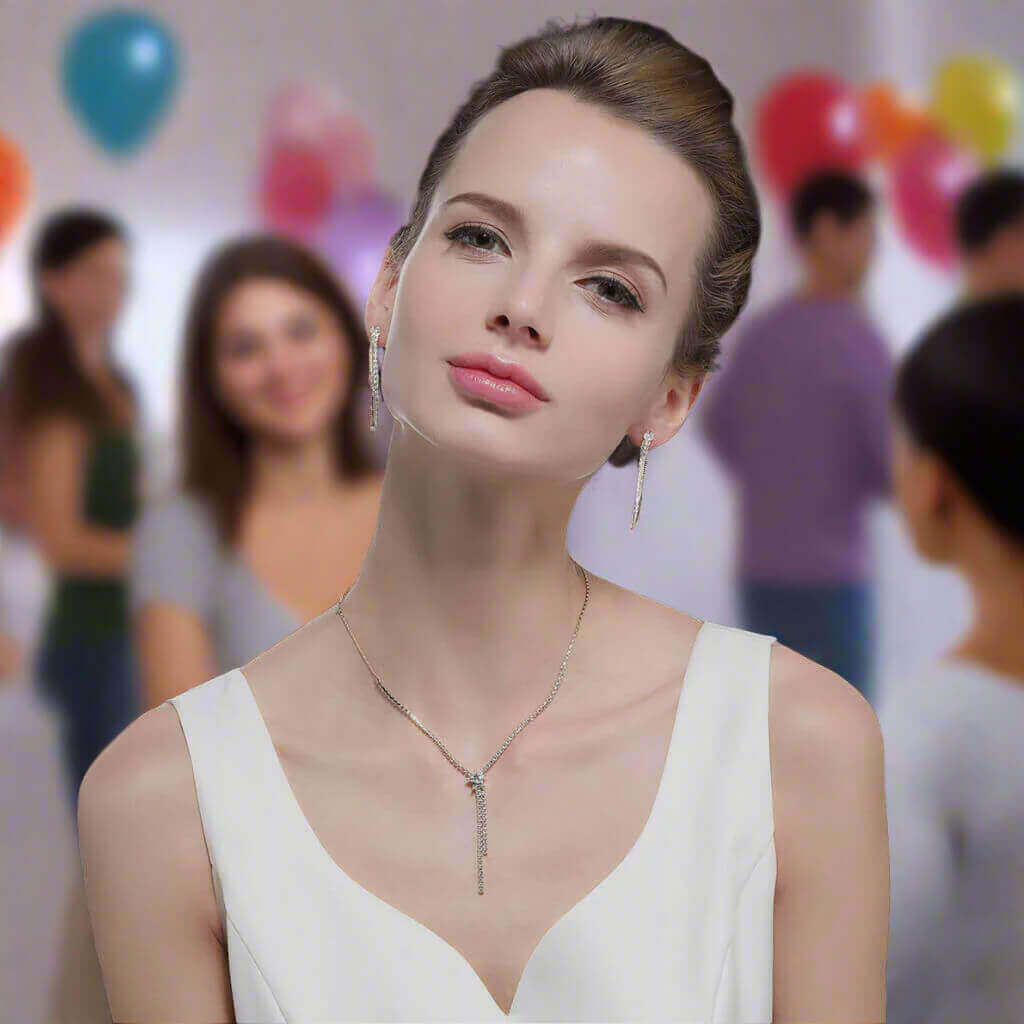 Woman in a white dress with a blurred background of people and balloons, with a woman wearing a wedding set of earrings and a pendant-Belle de Soiree