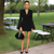 Dressy woman carrying a part rhinetones party bag.