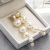 The Long White Pearl Statement Earrings. Great for a party. Belledesoiree.com