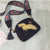 belledesoiree presents an embroidered bird on a velvet bag with tassles