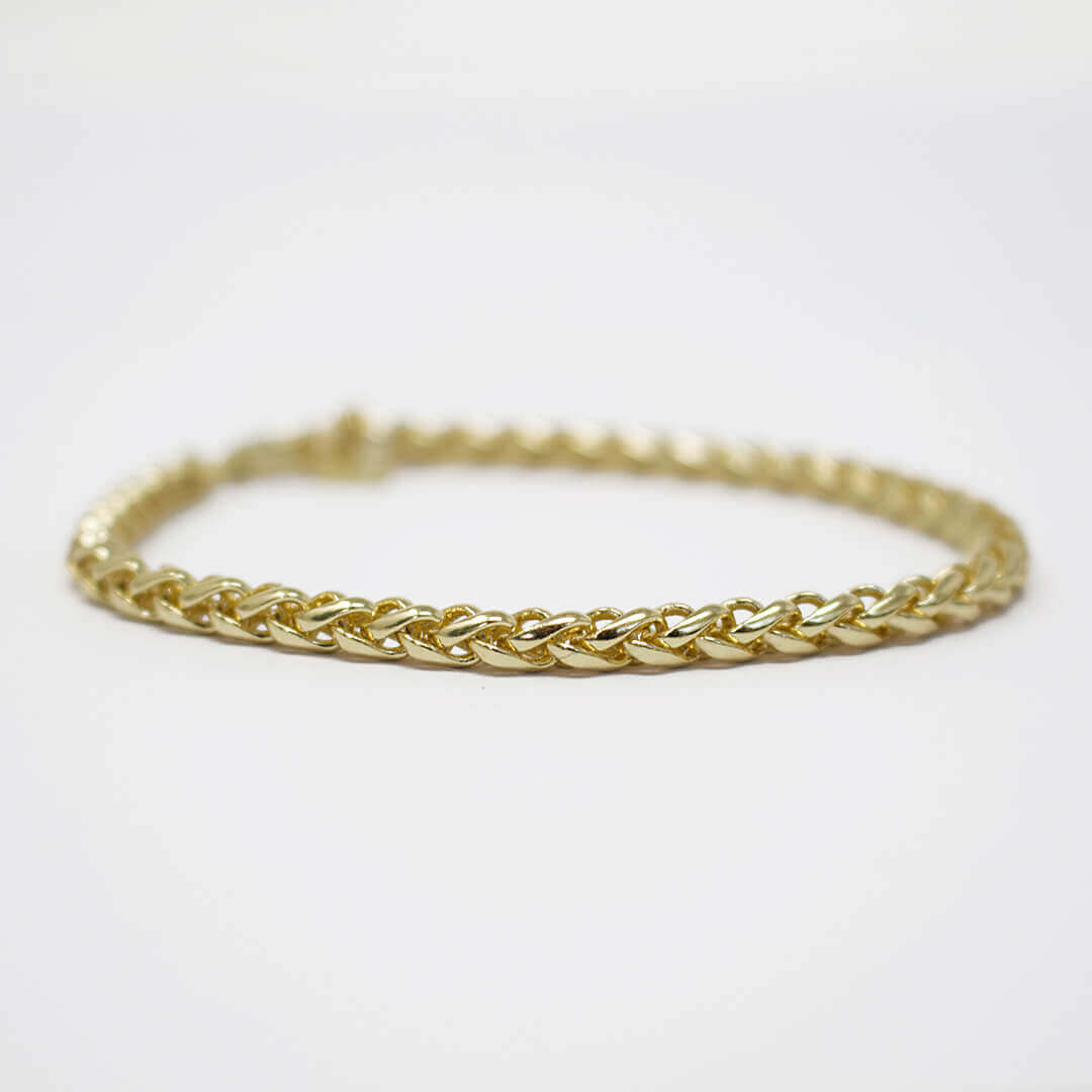 Beautiful gold bracelet shown flat -BELLE DE SOIREE beautiful gold bracelet