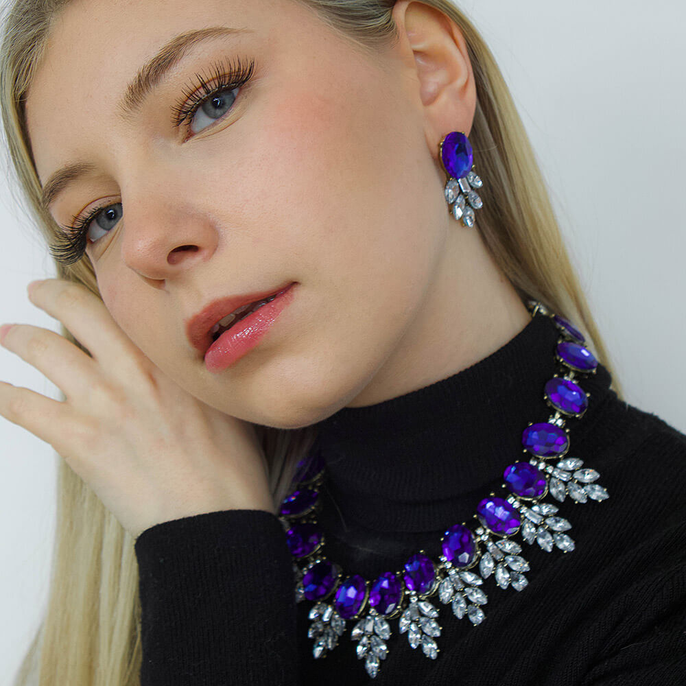 Blue Rhinestone Jewellery Set shown on a model with blond hair & black sweater-BELLEDESOIREE