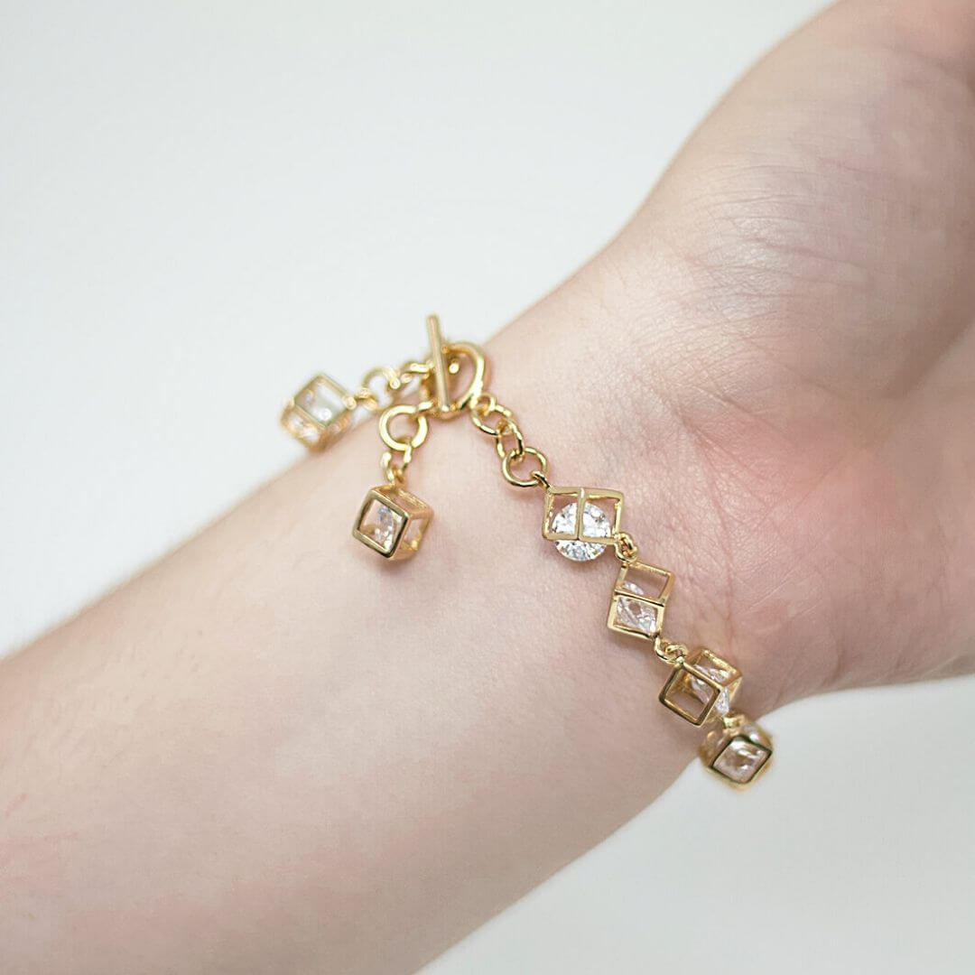 Cube Charm Bracelet shown on a model- BELLEDESOIREE