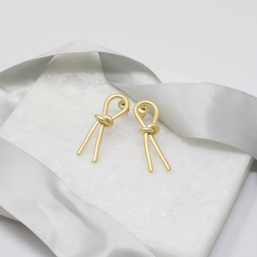 Gold color Stud Earrings shown fflat-BELLEDESOIREE