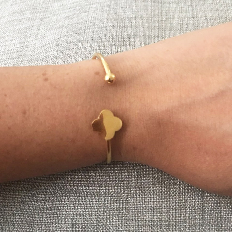Minimalist Clover and Ball Bangle shown on a model- BELLE DE SOIREE clover bangle