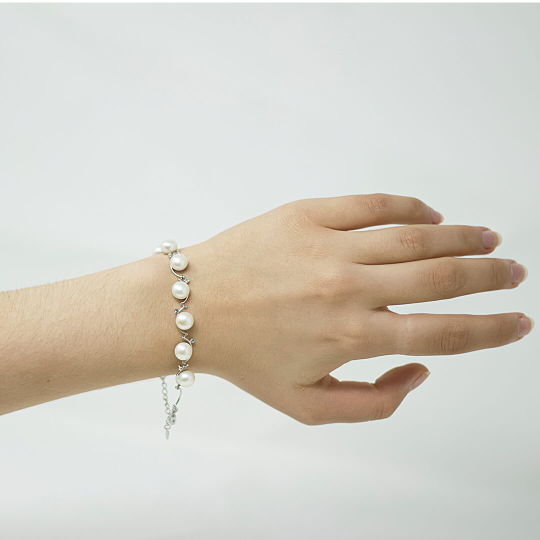 Pearl Crystal Silver Bracelet shown on a model-BELLEDESOIREE