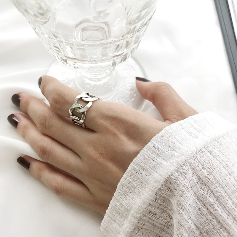 Retro Silver Chain Ring shown on a model with her hand flat- BELLE DE SOIREE retro silver ring