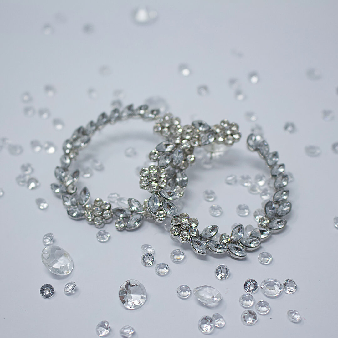 Sacha Crystal Leaf Stud Hoop Earrings shown in a rain of pearls- BELLE DE SOIREE Sacha