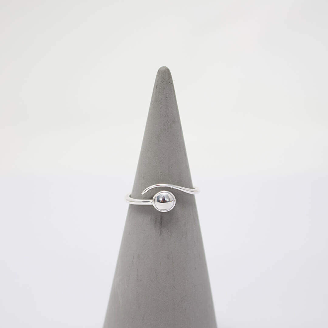 Silver ring shown on a pointed grey display- BELLE DE SOIREE silver ring