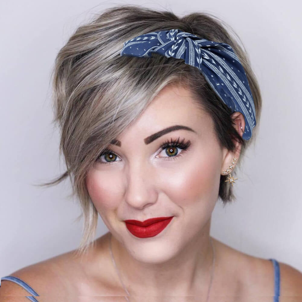 Small Crystal Star Earrings shown on a model wearing a blue hair piece- BELLEDESOIREE Small earrings