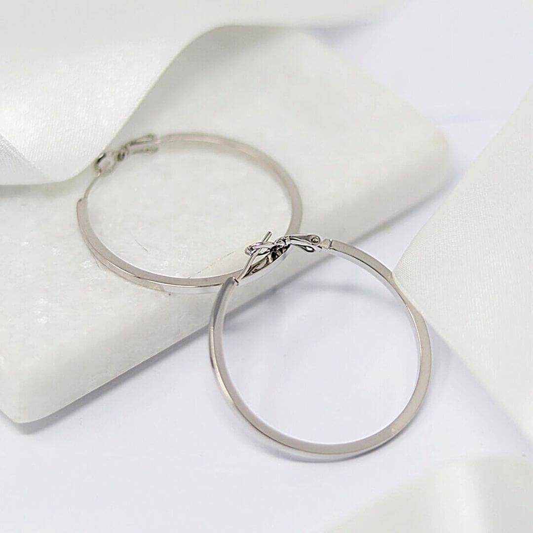 The Lean Hoops White Gold Earrings