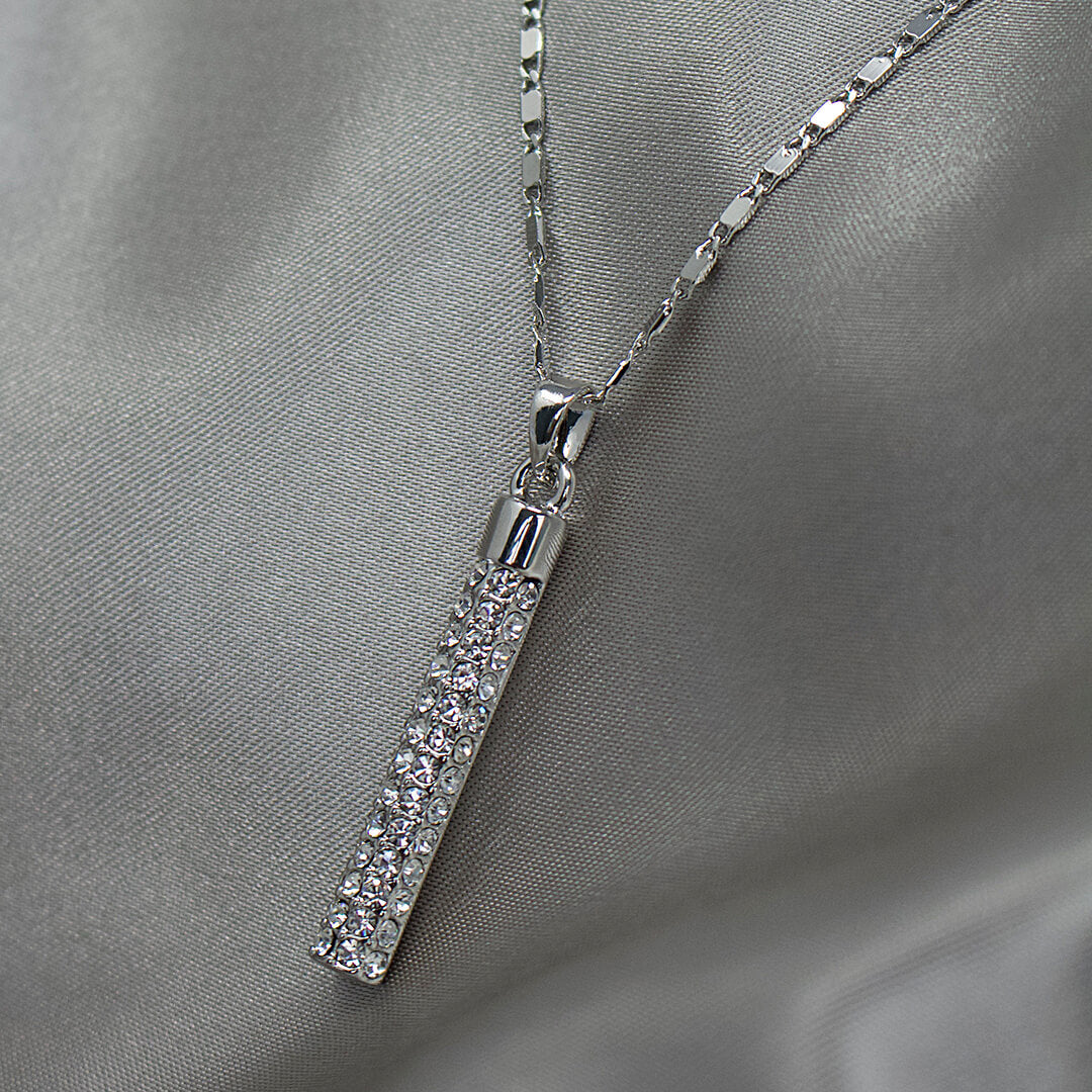 The Fountain Jewellery Set shown on a grey satin-belledesoiree.com
