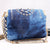 The Denim: Soft Braided Handbag  Be the belle de soiree with this fashionable, lightweight and splendid denim bag decorated with exquisite rhinestones , tassel and chain.Belledesoiree.com